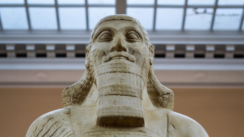 head and shoulders of statue of ashurnasirpal II.