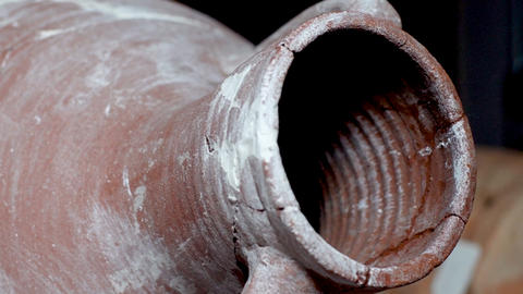 ancient clay food storage vessel.