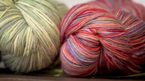 2 skeins of colorful yarn.