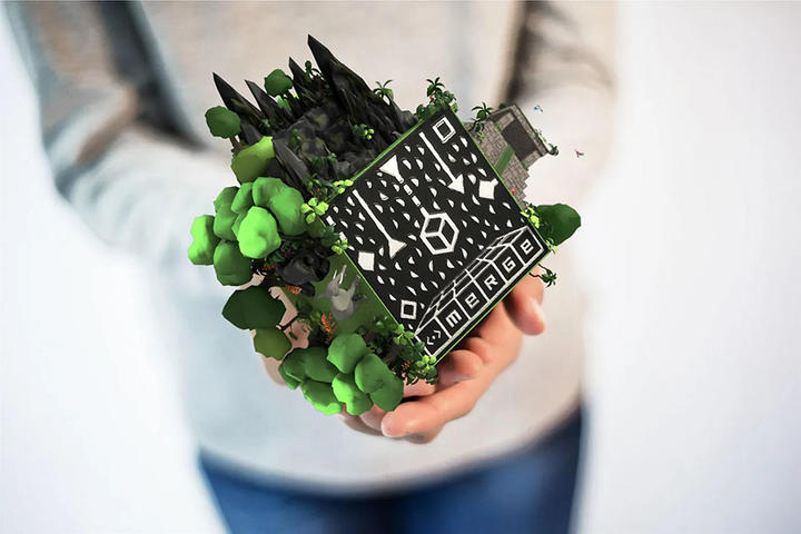 A computer generated image of a fantastical CGI cube in a person's hands.