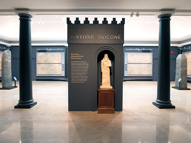 Gallery with statues and stele.