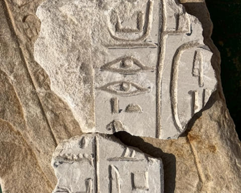 An artifact featuring several glyphs.