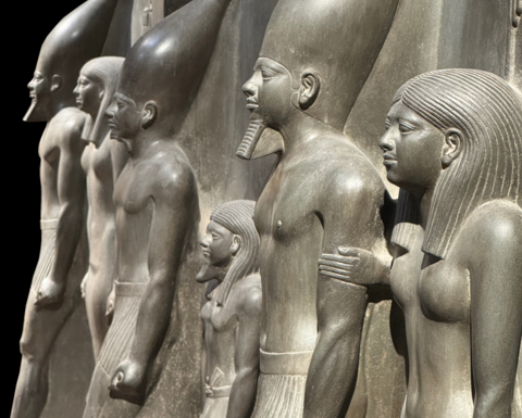 A photo of the Menkaure triad statues.
